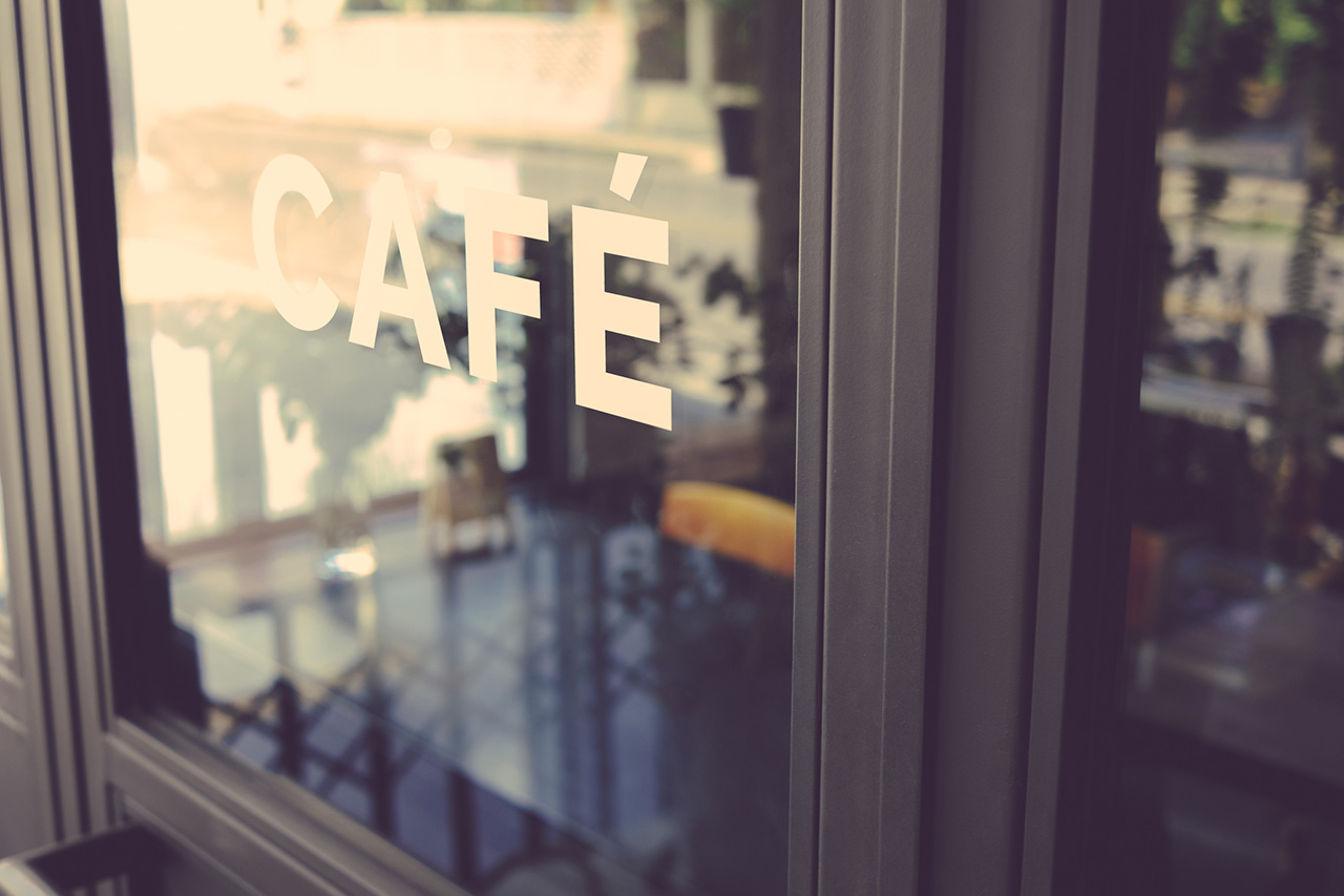 Alphabet cafe word on the window vintage color